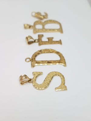 Five Assorted 10k Yellow Gold Initial Lot