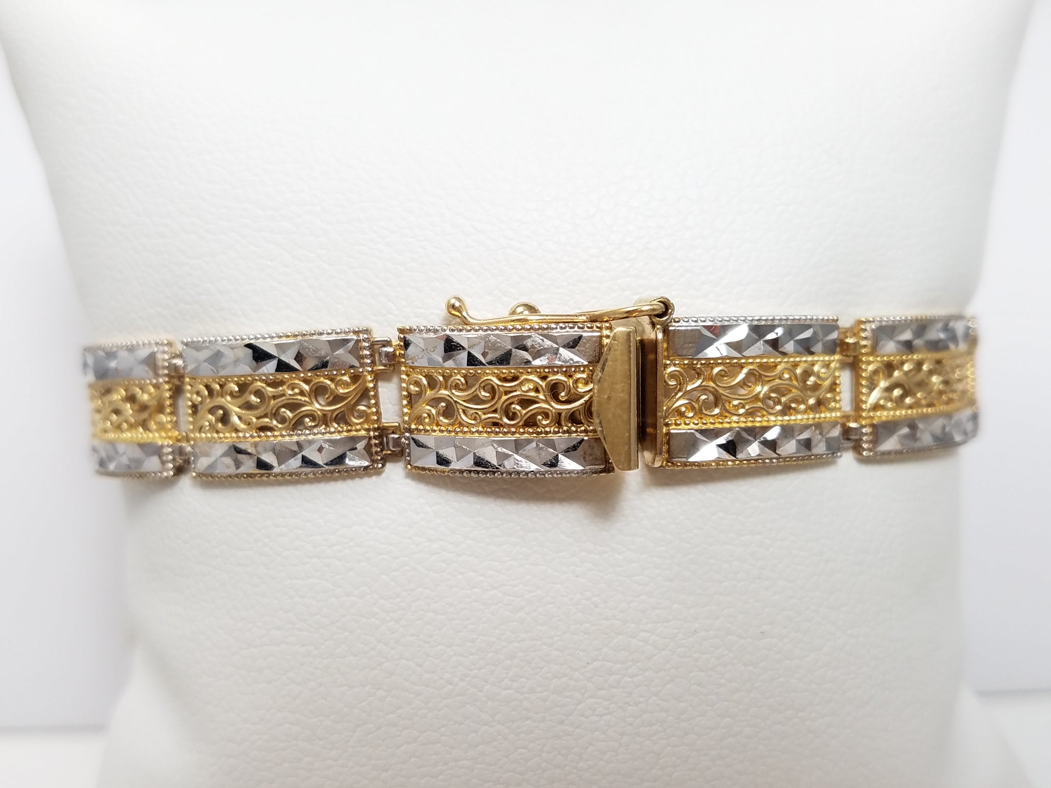 Intricate 7" 10k Two Tone Gold Diamond Cut Link Bracelet