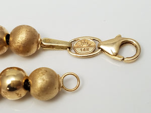 Sophisticated 18" 14k Yellow Gold Hollow Graduated Bead Necklace