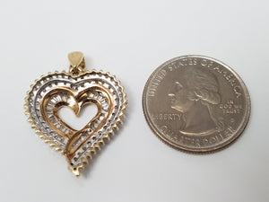 Luxurious 10k Yellow Gold Natural Diamond Heart Pendant