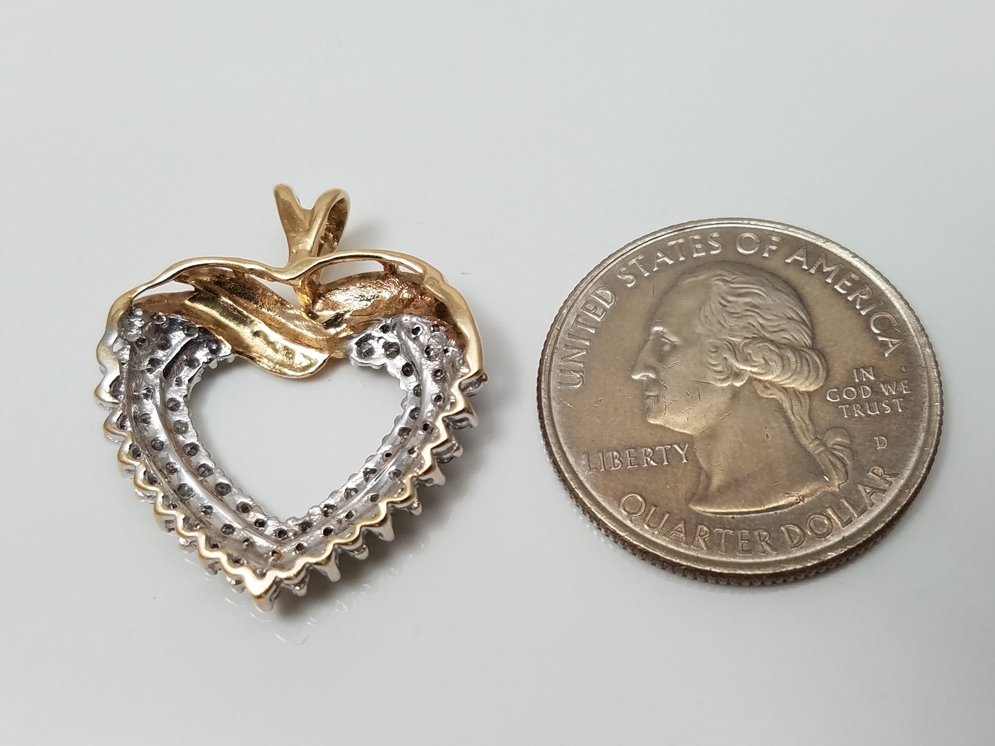 Magical 10k Yellow Gold Natural Diamond Heart Pendant