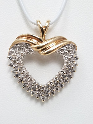 Magical 10k Yellow Gold Natural Diamond Heart Pendant
