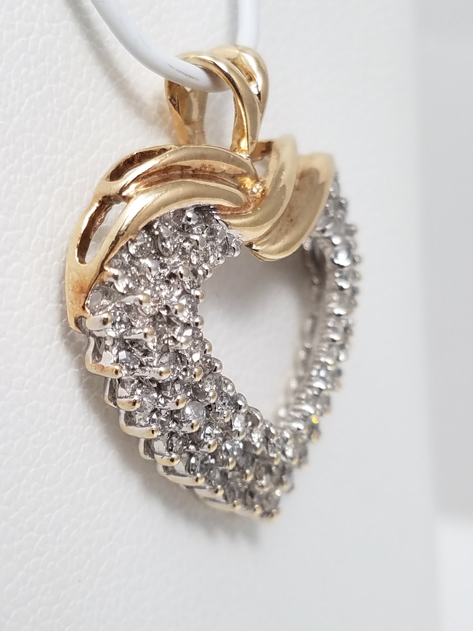 Magical 10k Yellow Gold Natural Diamond Heart Pendant