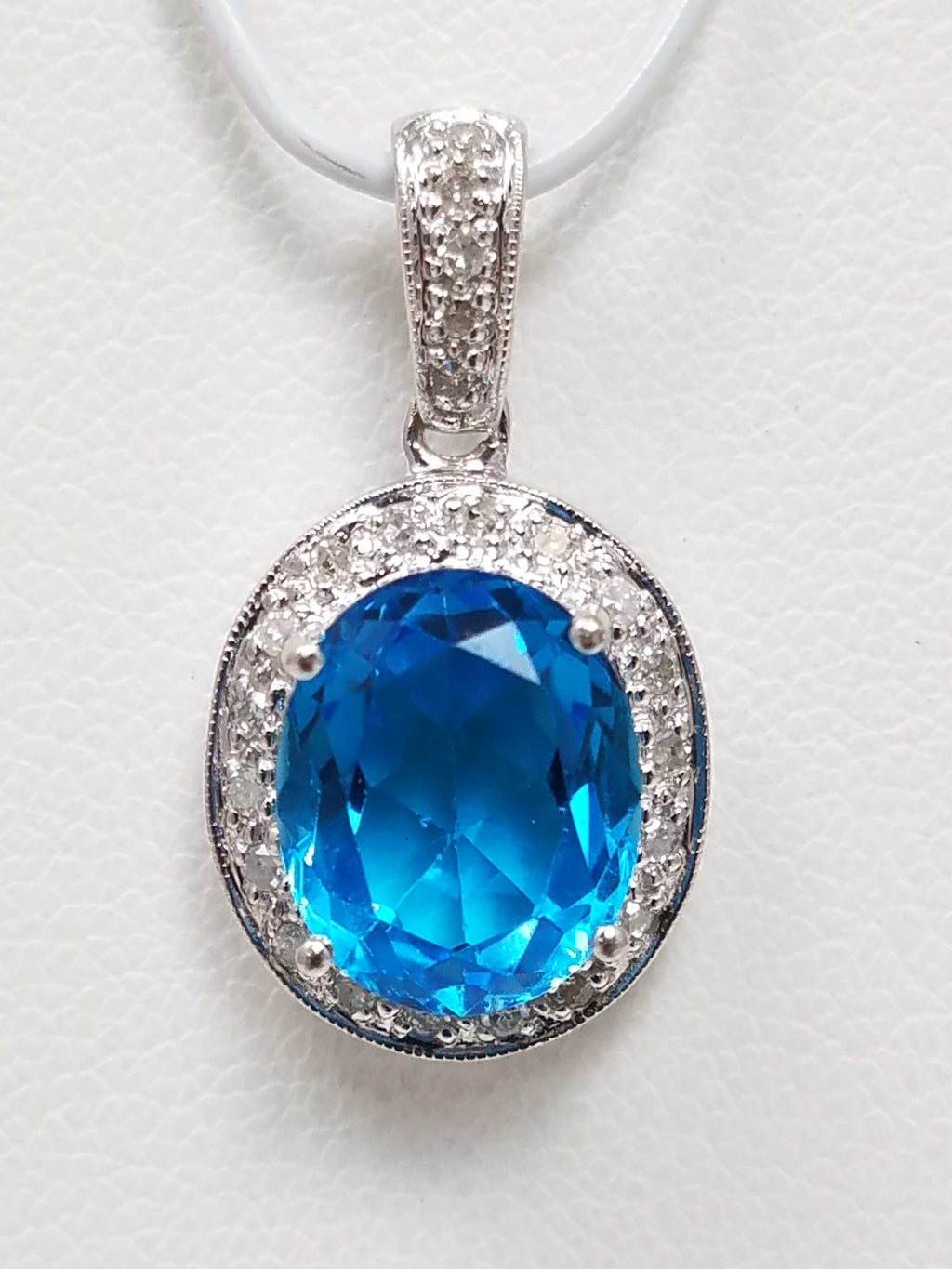 Glamorous 14k White Gold Natural Blue Topaz Diamond Pendant