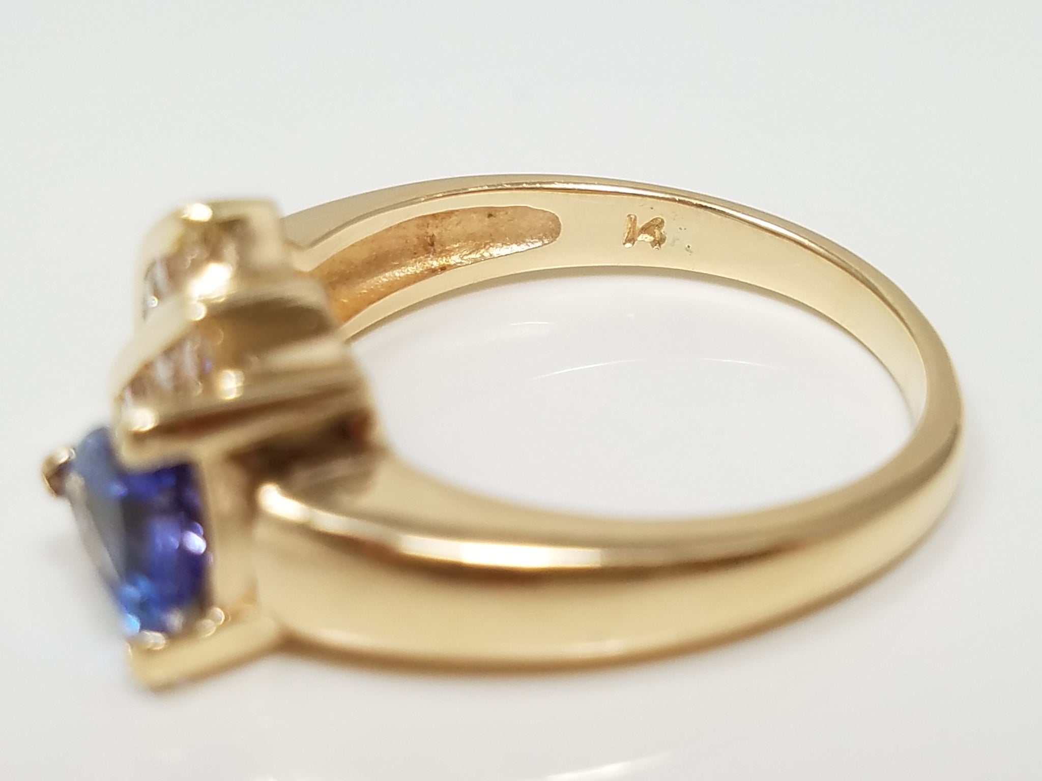 Dynamic 14k Yellow Gold Natural Tanzanite Diamond Custom Ring