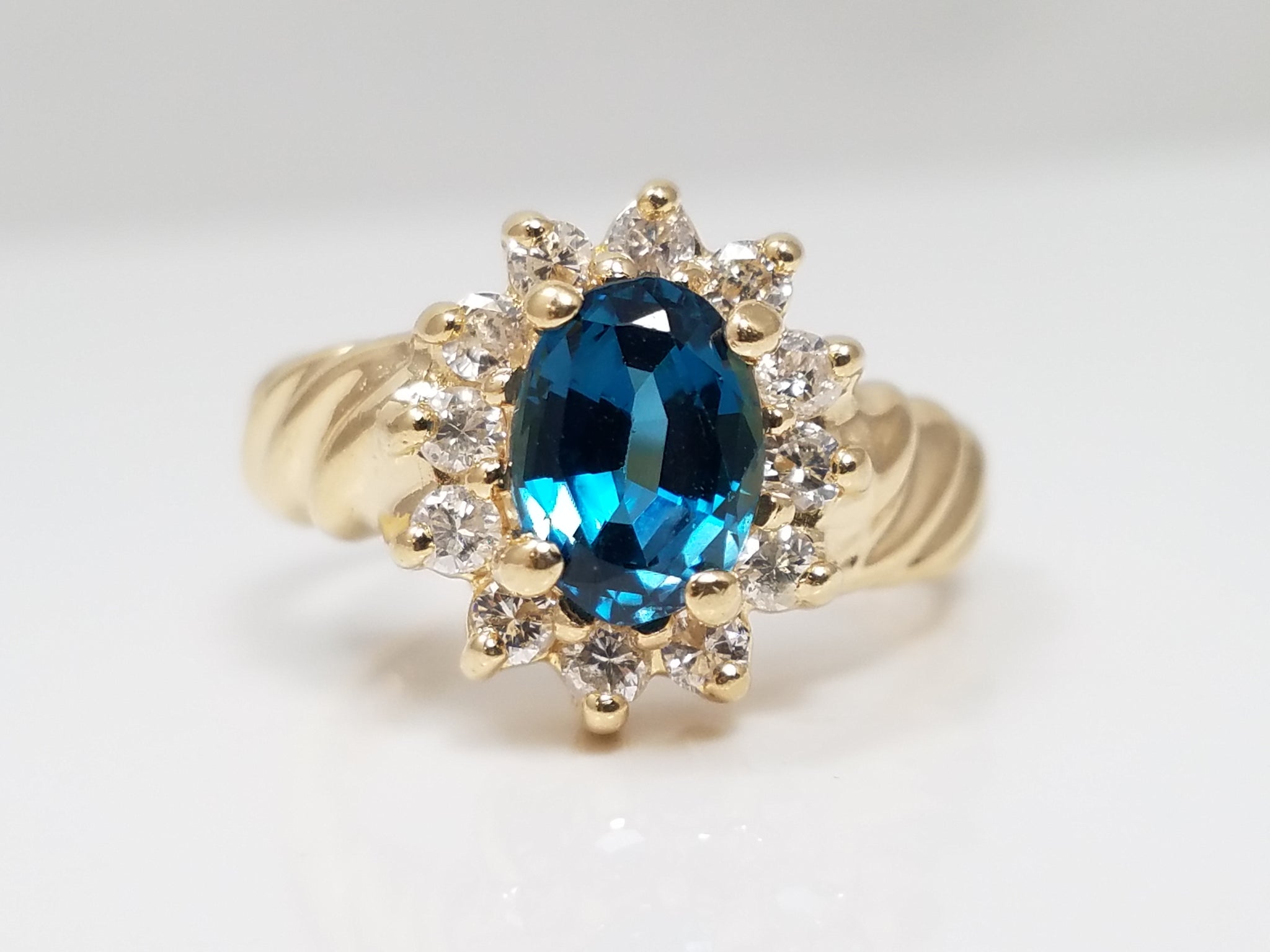 Elegant 14k Yellow Gold Natural Blue topaz Diamond Halo Ring