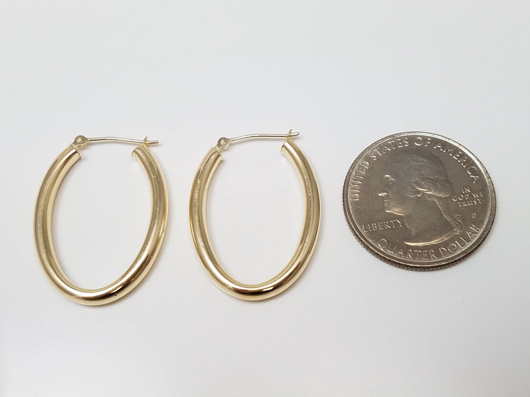 Attractive 10k Yellow Gold Hollow Elongated Hoop Earrings