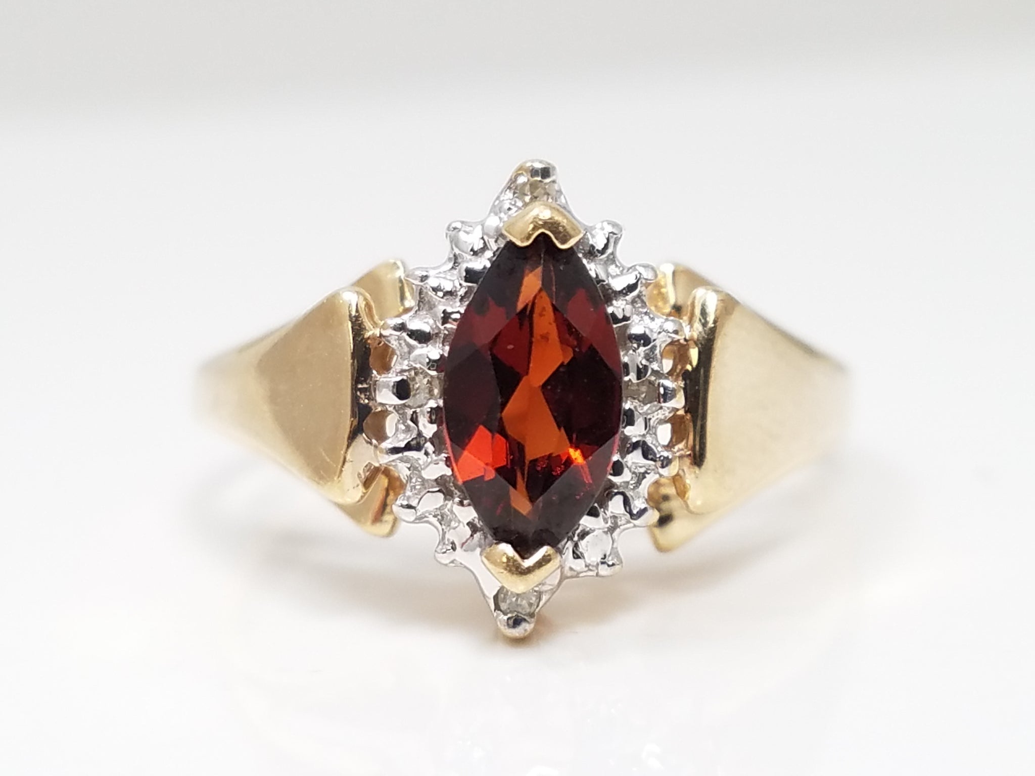 Fiery Natural Garnet + Diamond Halo Ring in 10k Yellow Gold
