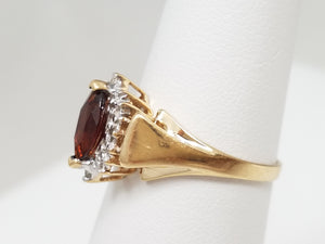 Fiery Natural Garnet + Diamond Halo Ring in 10k Yellow Gold