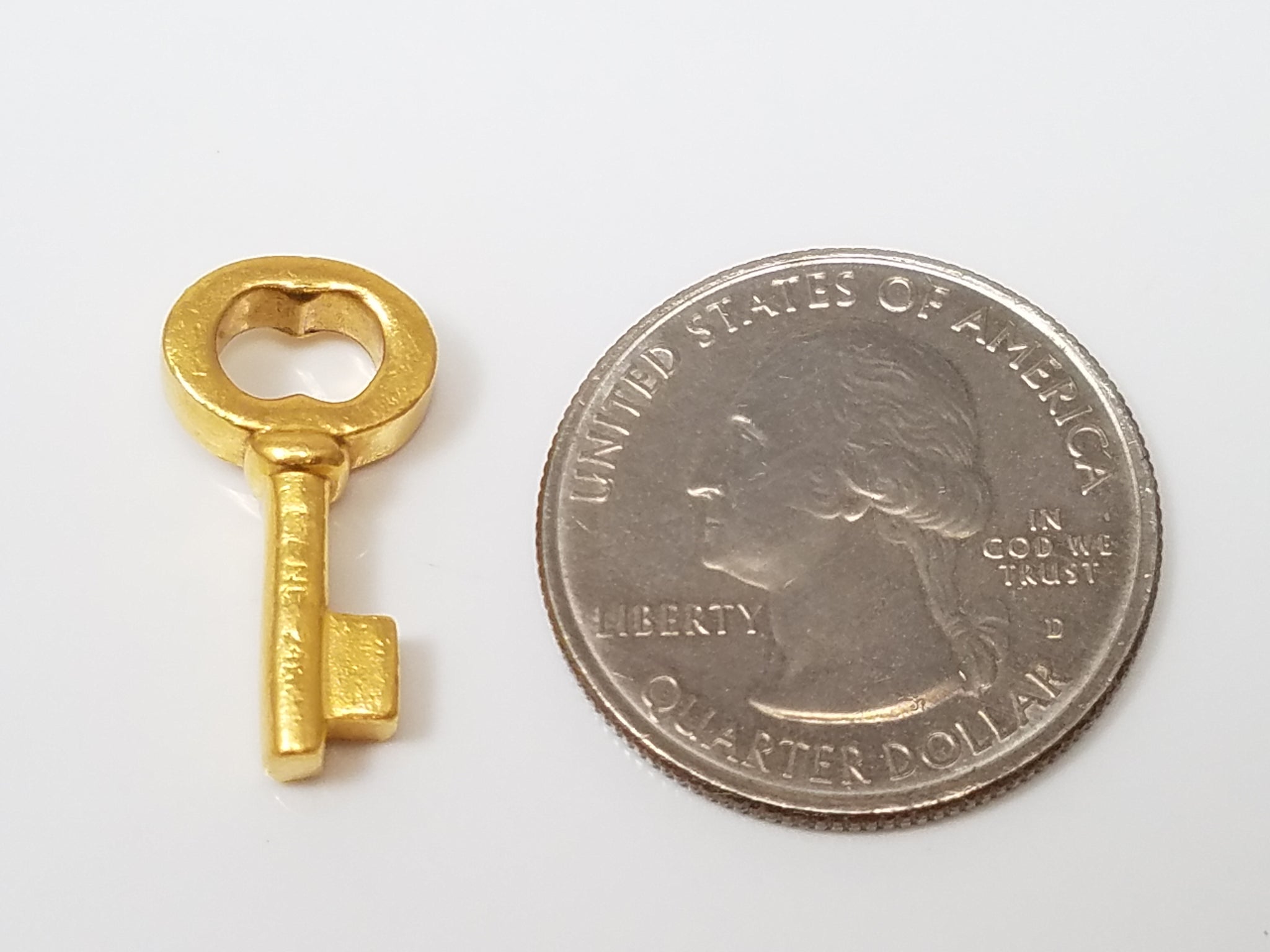 MENE $1,100 Retail Solid 24k Yellow Gold Key Pendant