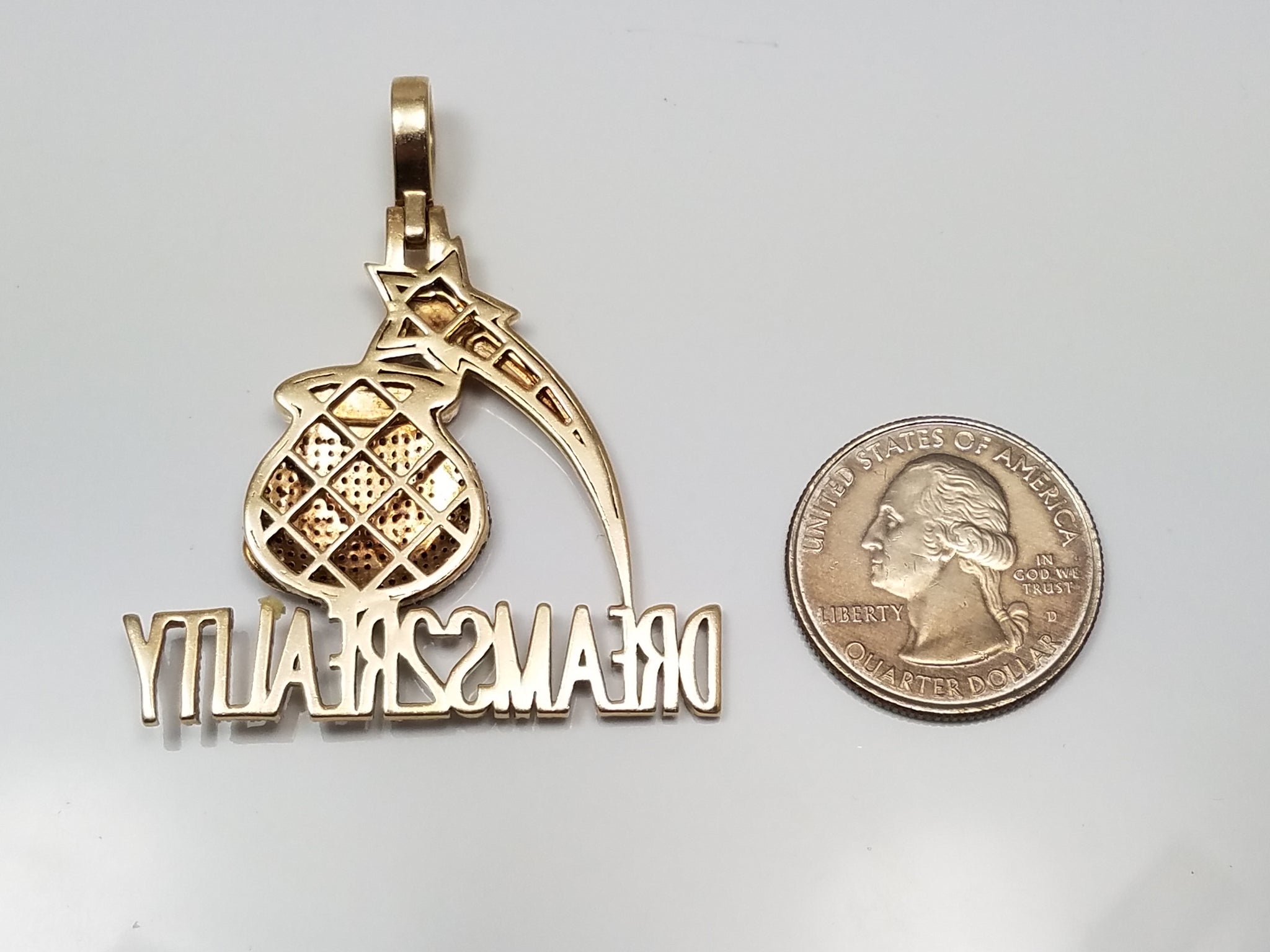 Tantalizing 10k Yellow Gold Natural Diamond "Dreams2Reality" Pendant