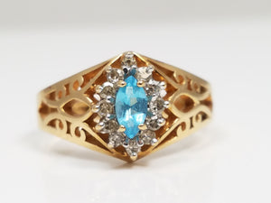 Fashionable 10k Yellow Gold Natural Blue Topaz Diamond Pierced Ring