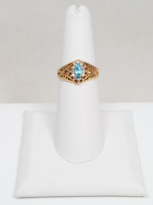 Fashionable 10k Yellow Gold Natural Blue Topaz Diamond Pierced Ring