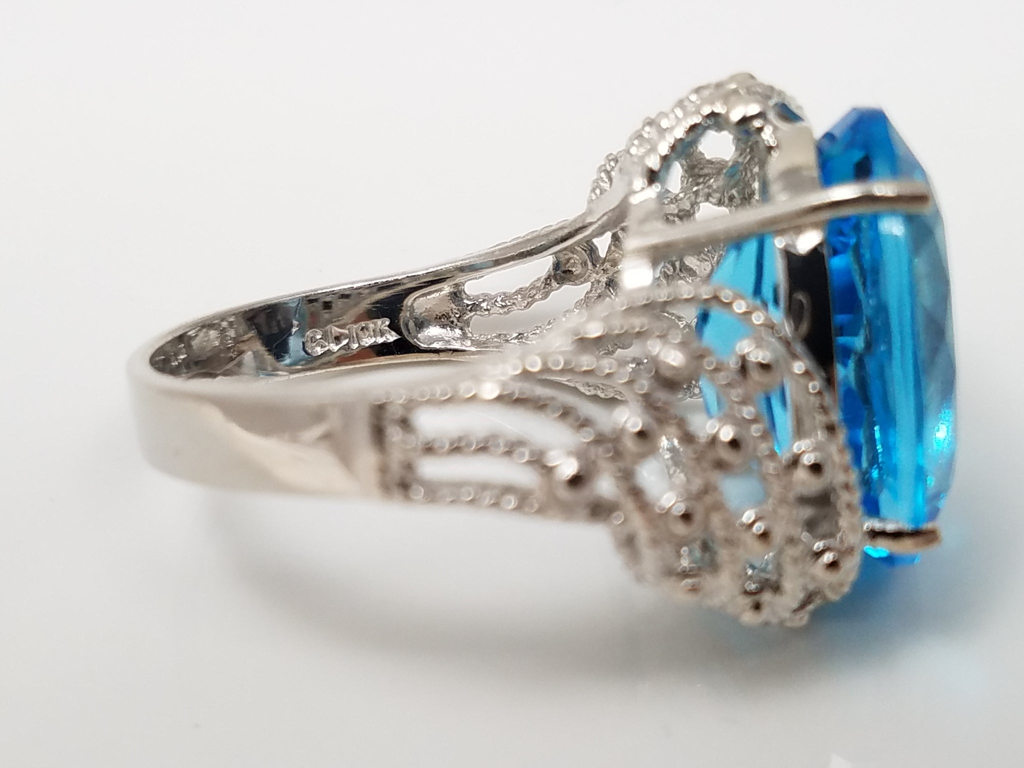 New! Sensational 10k White Gold Natural Blue Topaz Pierced Ring