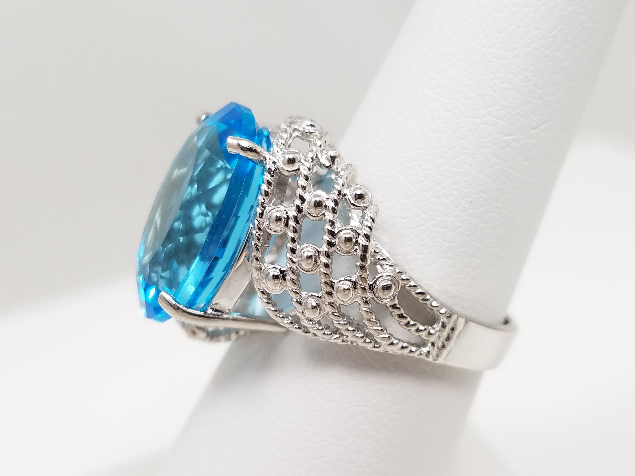 New! Sensational 10k White Gold Natural Blue Topaz Pierced Ring