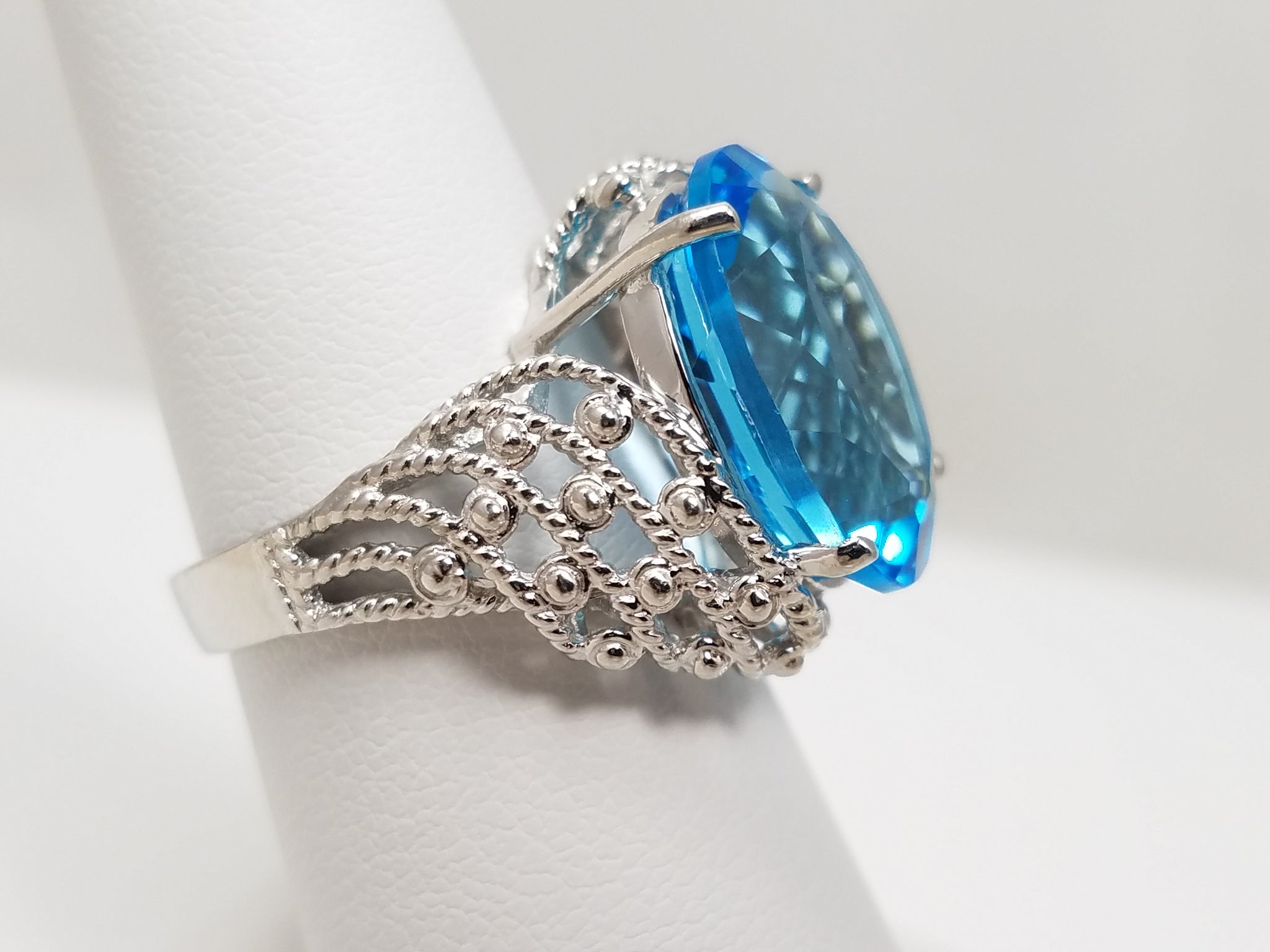 New! Sensational 10k White Gold Natural Blue Topaz Pierced Ring