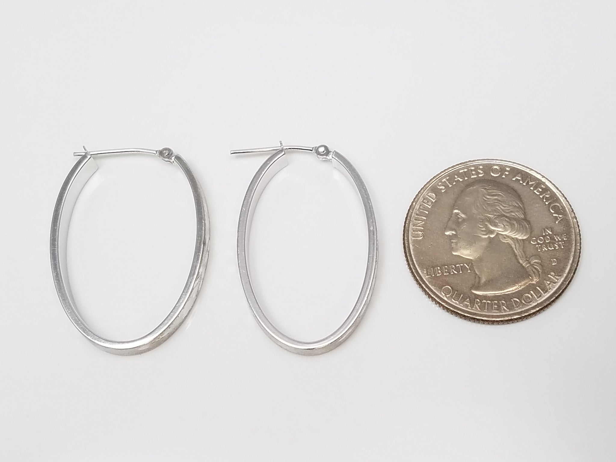 Shimmering 14k White Gold Diamond Cut Hollow Hoop Earrings