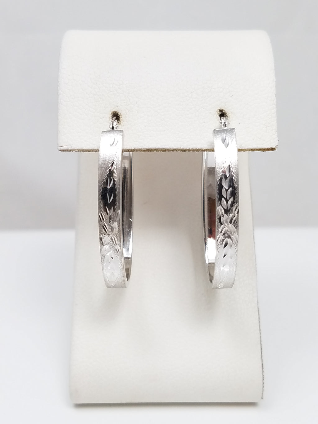 Shimmering 14k White Gold Diamond Cut Hollow Hoop Earrings