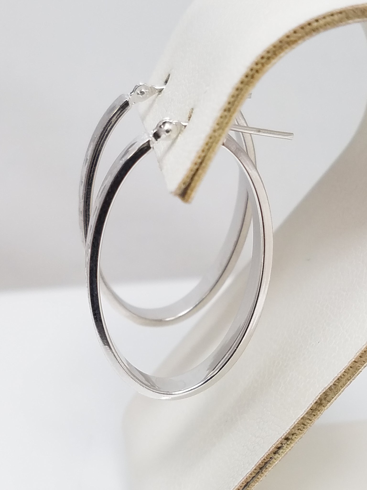 Shimmering 14k White Gold Diamond Cut Hollow Hoop Earrings