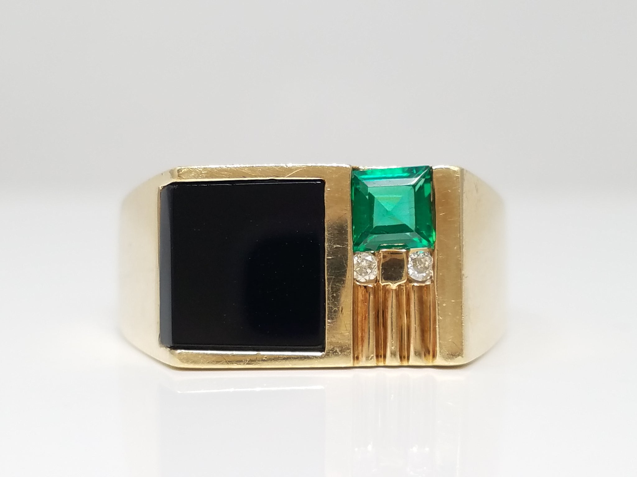 Dynamic 10k Yellow Gold Lab Created Emerald Natural Onyx Diamond Ring