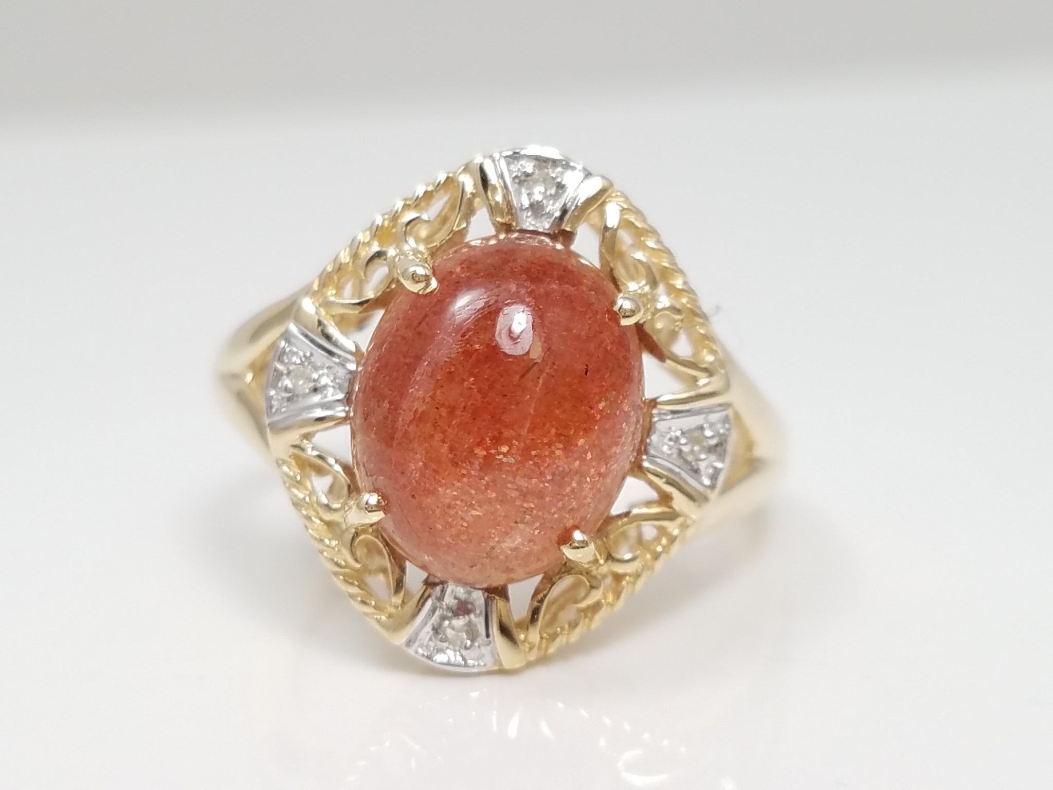 Sophisticated 10k Two Tone Gold Man Made Goldstone Natural Diamond Ring