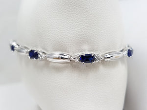 Dazzling 7.5" 10k White Gold Lab Created Sapphire Bracelet
