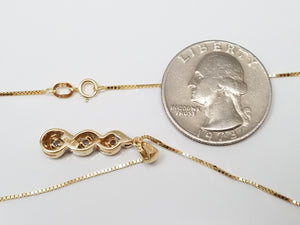 10k Yellow Gold Natural Diamond Swirl Pendant Necklace
