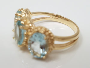 Brilliant 10k Yellow Gold Natural Aquamarine Three Stone Ring