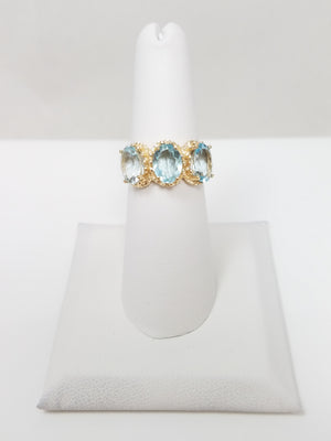 Brilliant 10k Yellow Gold Natural Aquamarine Three Stone Ring