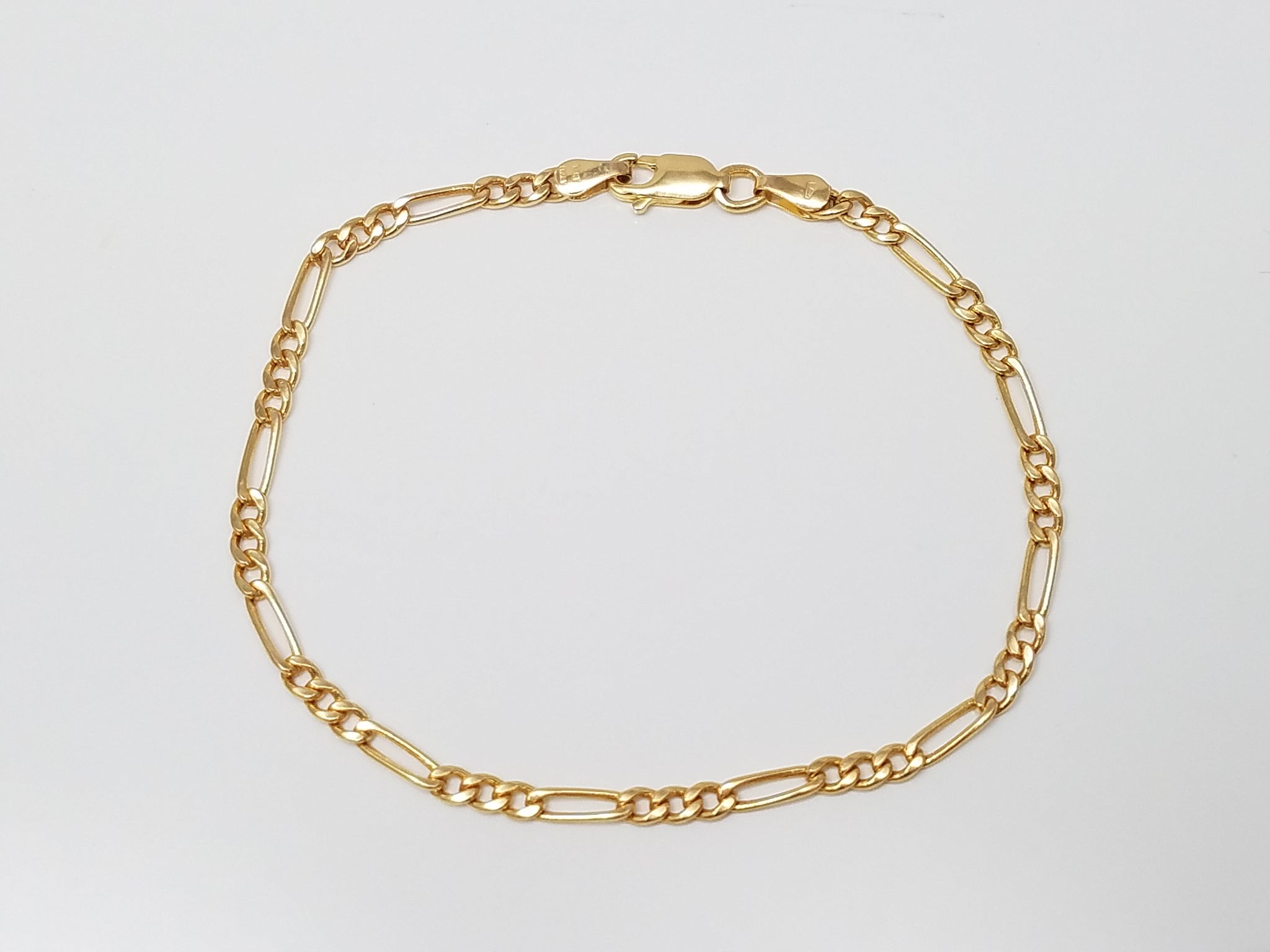 Traditional 7.25 14k Yellow Gold Figaro Link Bracelet