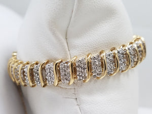 Showy 10k Two Tone Gold 7" Natural Diamond Tennis Bracelet