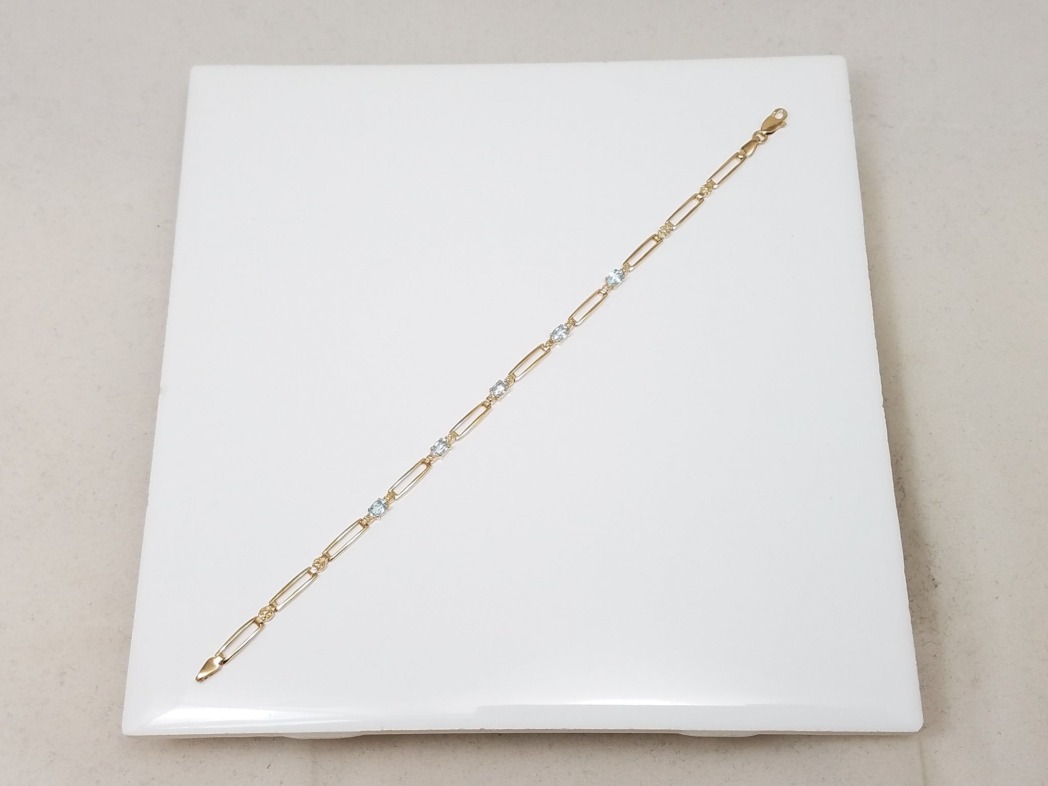Frilly 7" 10k Yellow Gold Natural Blue Topaz Bracelet