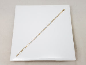 Frilly 7" 10k Yellow Gold Natural Blue Topaz Bracelet