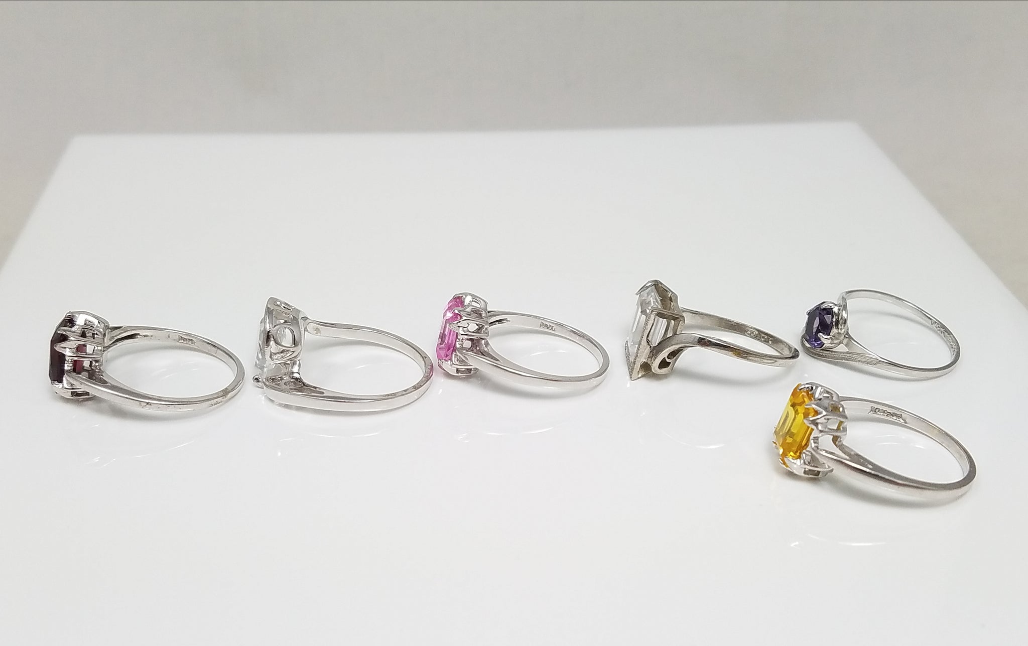 Six New Old Stock 10k White Gold Synthetic Gemstone Ring Lot