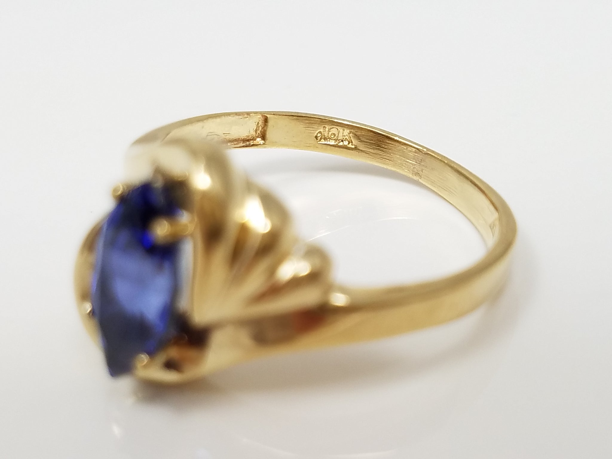 Magnificent 10k Yellow Gold Lab Created Sapphire Ring