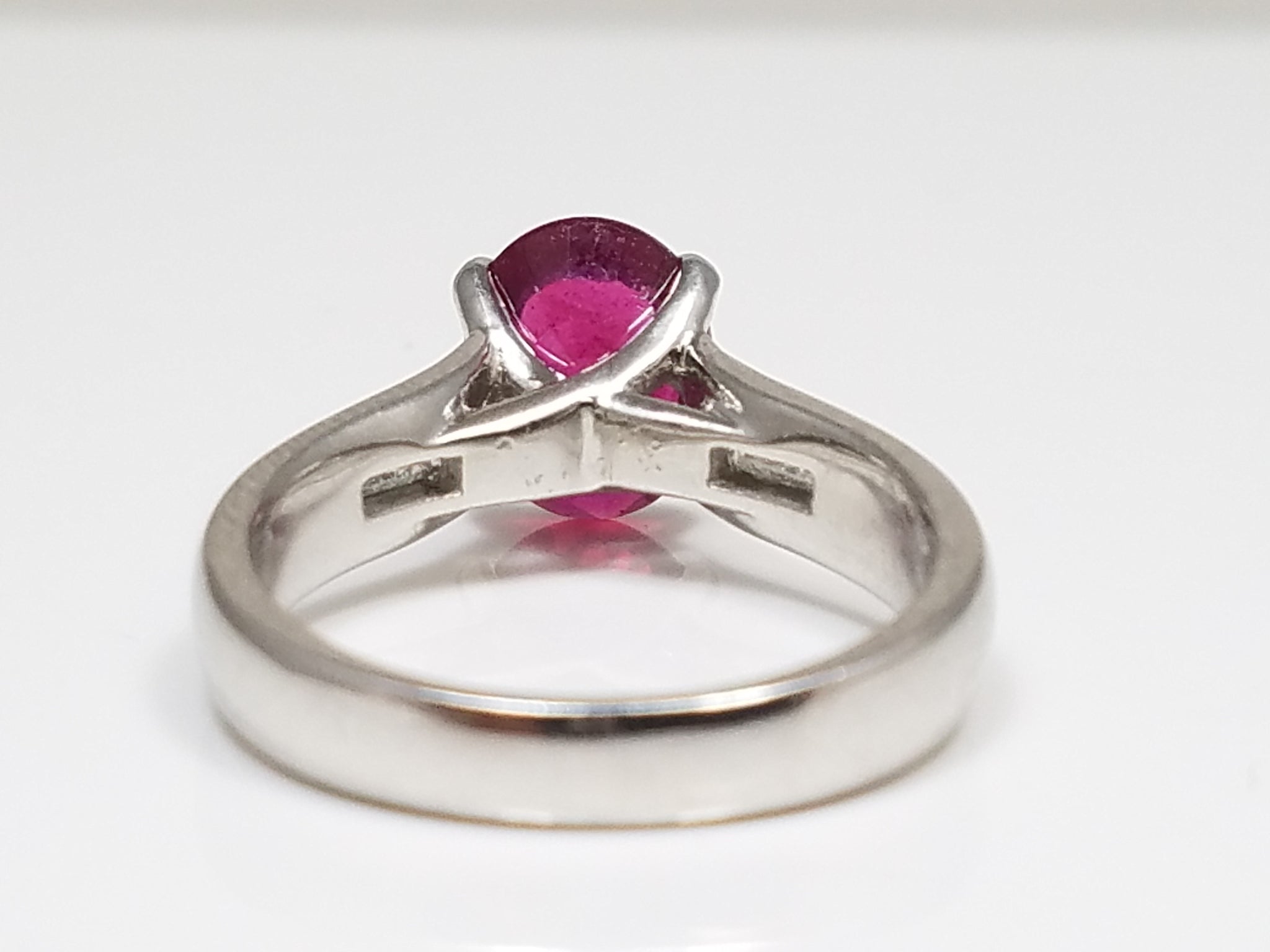 Gleaming Platinum Natural Glass Filled Ruby Diamond Ring