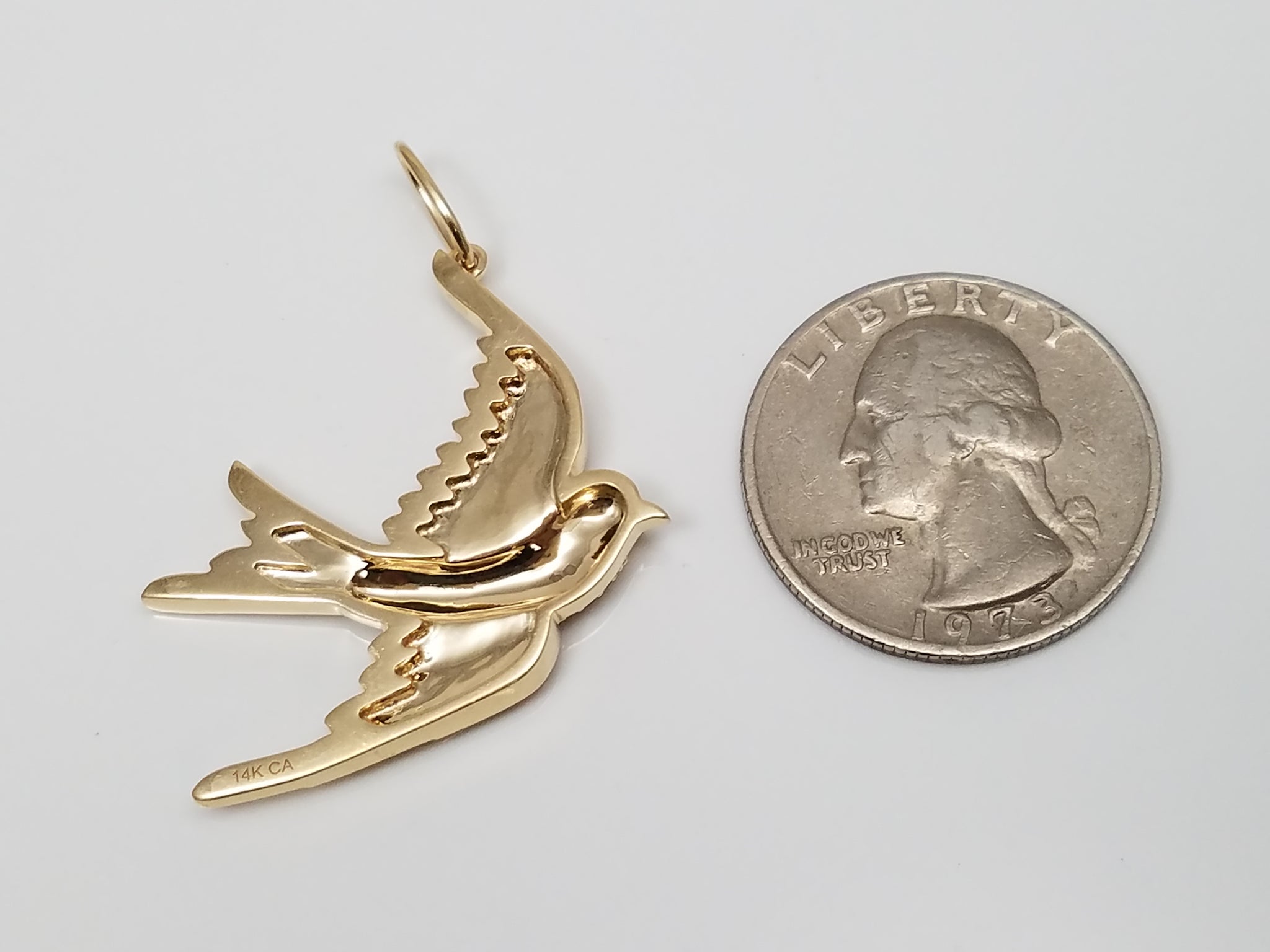 Flowing 14k Yellow Gold Natural Diamond Emerald Bird Pendant