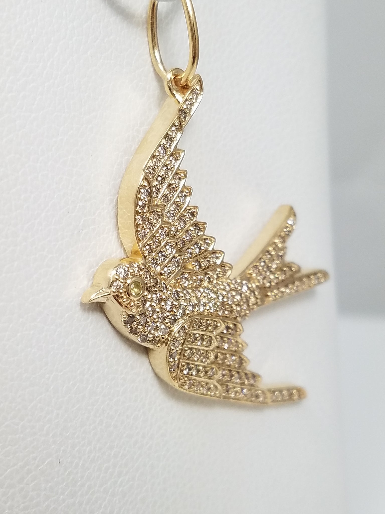 Flowing 14k Yellow Gold Natural Diamond Emerald Bird Pendant