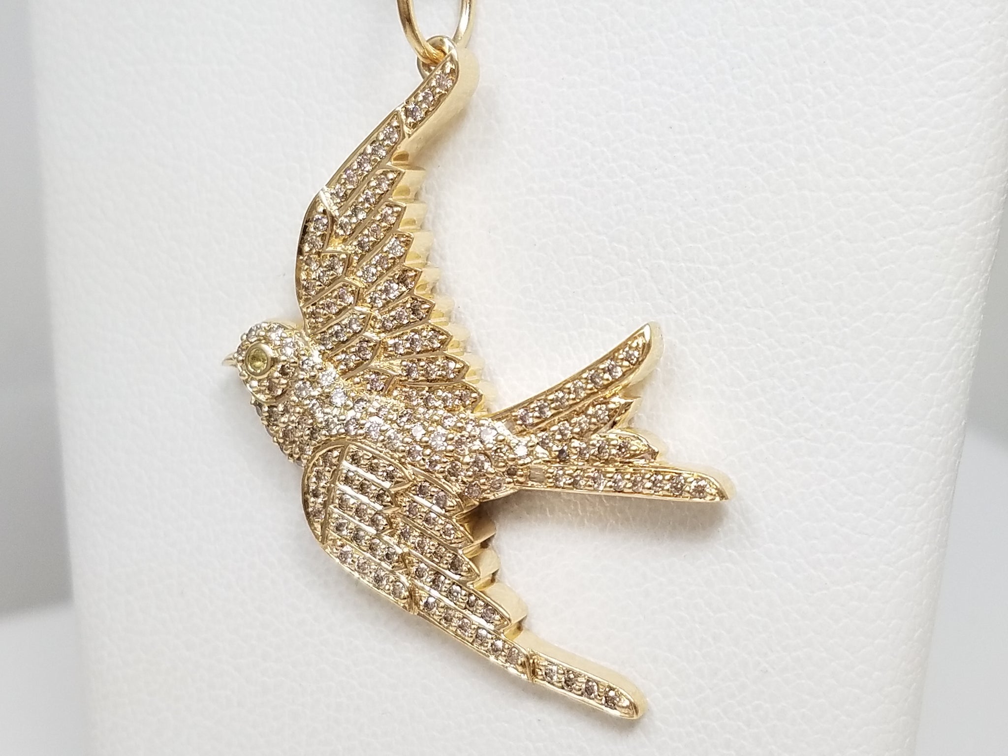 Flowing 14k Yellow Gold Natural Diamond Emerald Bird Pendant