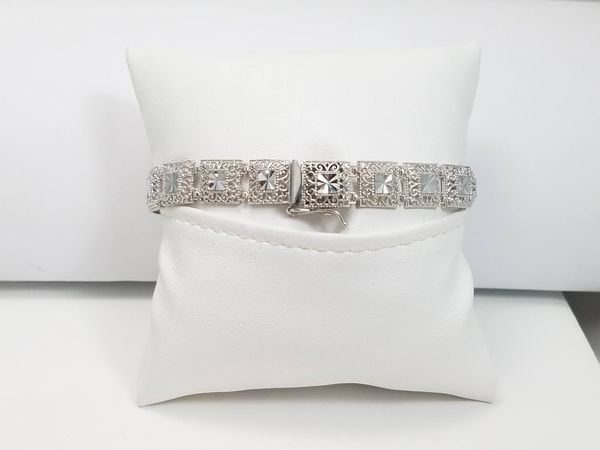 7 3/8" Shimmering 10k Gold Diamond Cut Fancy Link Bracelet