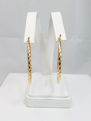 Dynamic 14k Yellow Gold Hollow Hoop Twisty Earrings