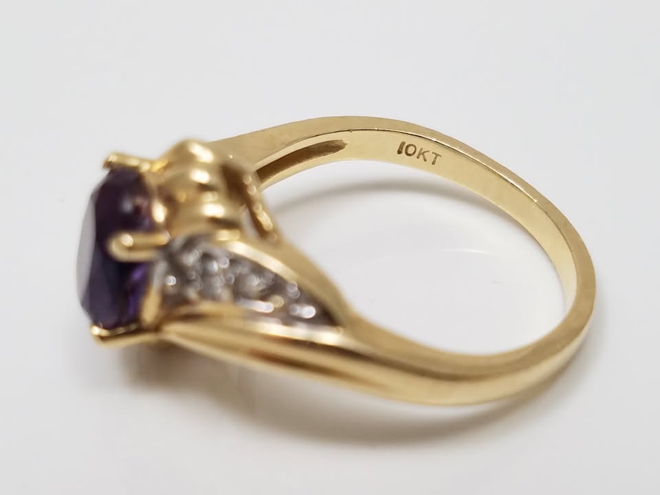 Exciting 10k Yellow Gold Natural Amethyst Diamond Bypass Ring