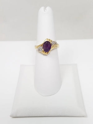 Exciting 10k Yellow Gold Natural Amethyst Diamond Bypass Ring